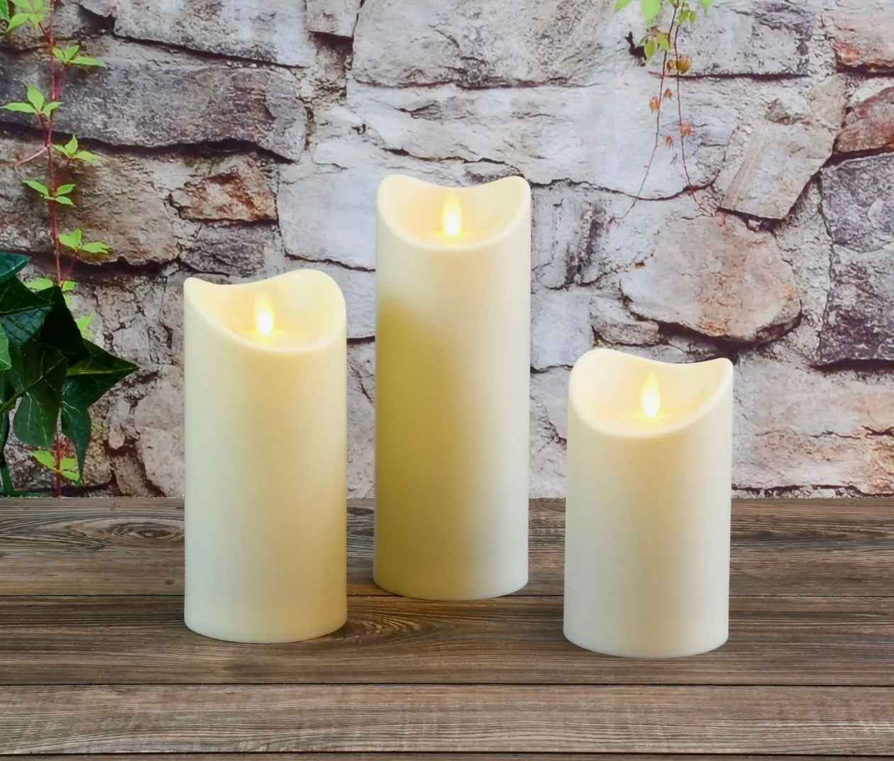 LumaBase Battery Operated LED Candles with Moving Flame - Set of Three
